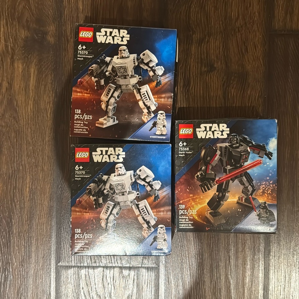 3 unopened Star Wars Lego sets.